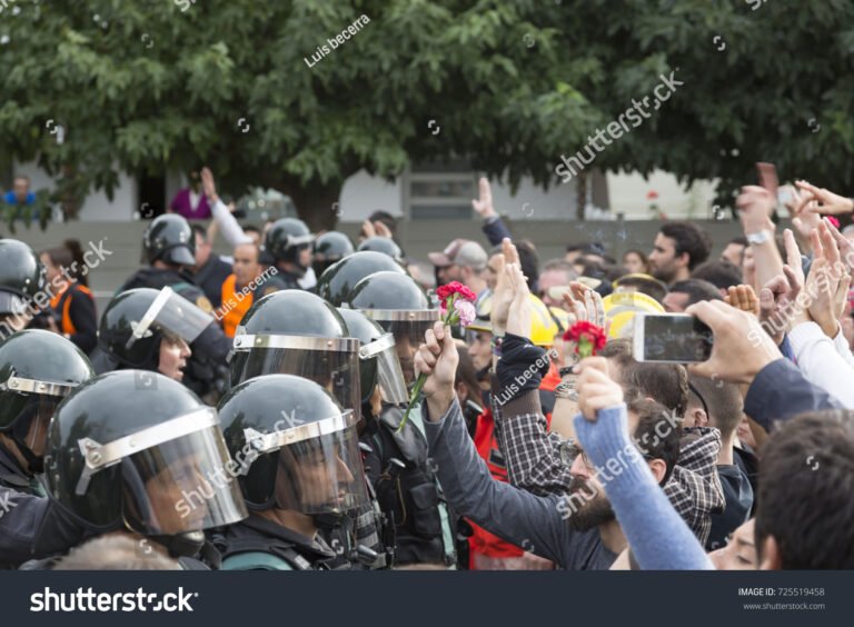 stock-photo-sant-julia-de-ramis-catalonia-spain-october-protesters-are-evicted-from-the-polling-725519458